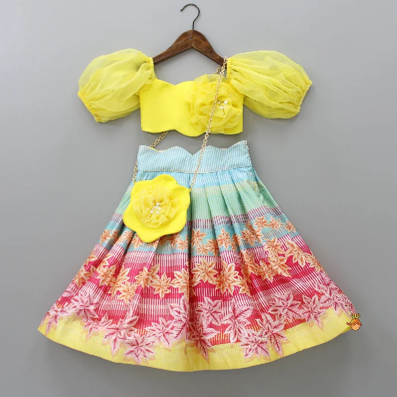 Scalloped Neck Yellow Organza Top And Printed Lehenga With Floral Sling Bag